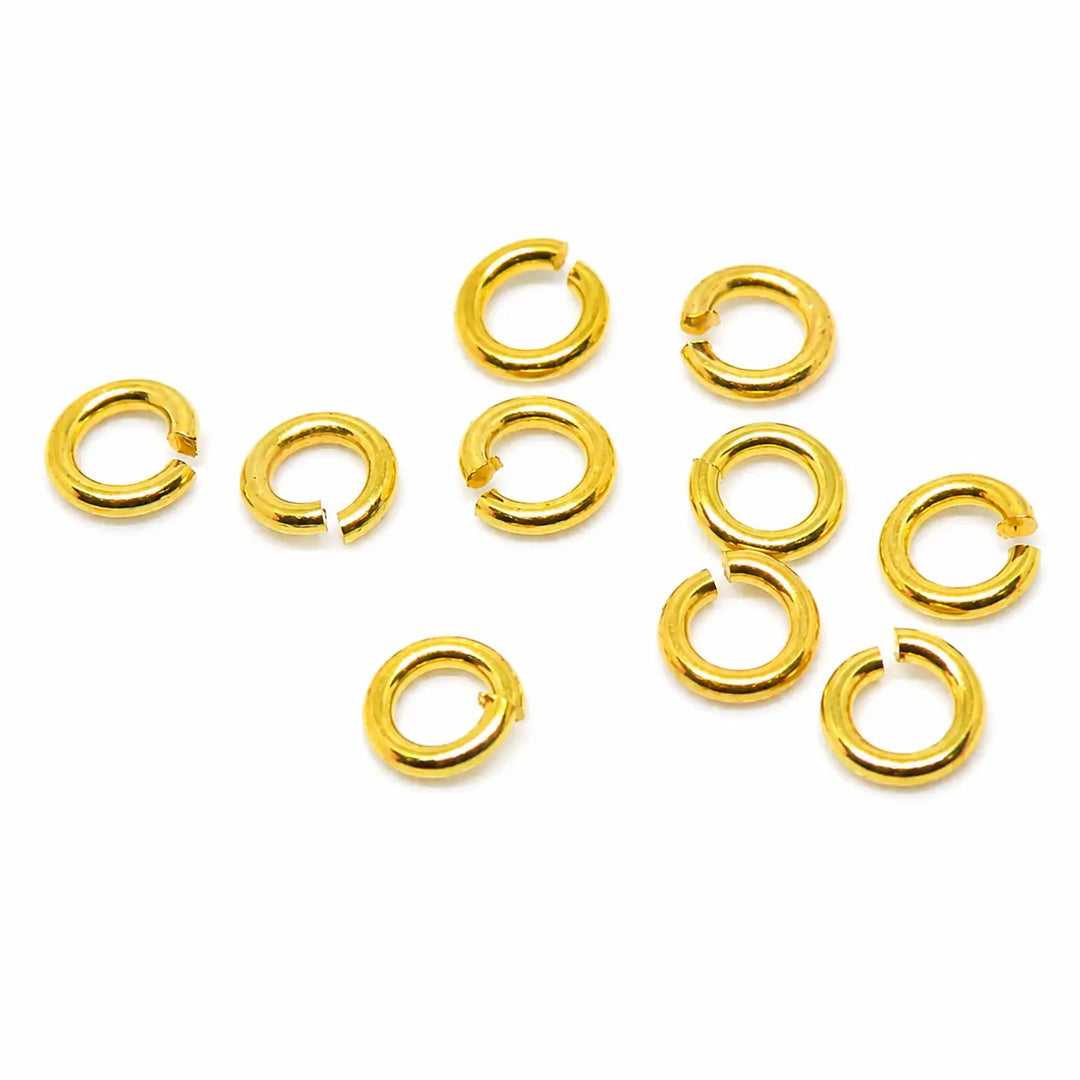 Øskner, åbne, messing forgyldt, 5x0,8mm