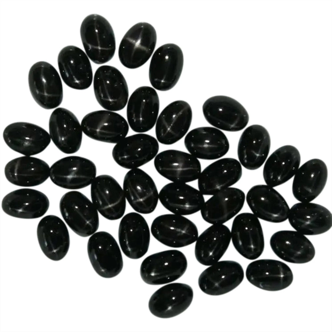 Cabochon, black star diopside, oval, 5x7mm, 1-10stk 