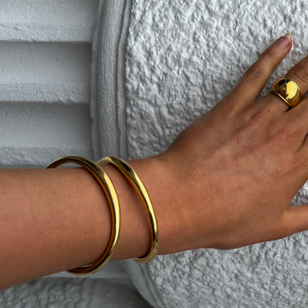 Bracelet, Open bangle, gilded brass, 65x50 mm