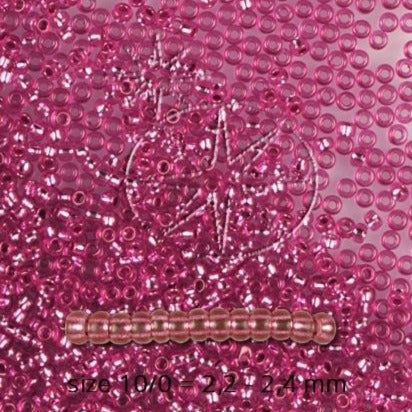 Pink Glasperle. Preciosa Seed Beads. Pink dyed crystal, silver lined