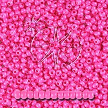 Pink Glasperle. Preciosa Seed Beads.pink intensive dyed chalkwhite