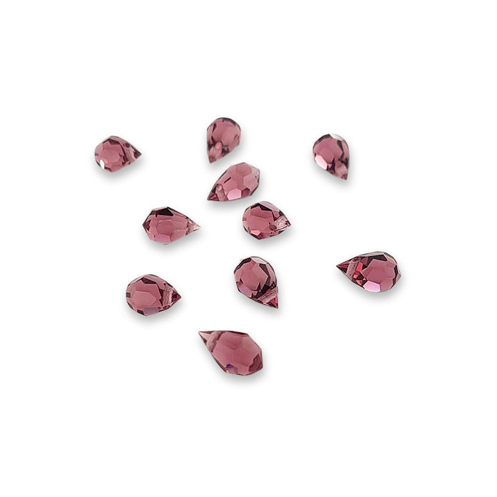 Pink Preciosa Crystal Drops i Støvet rosa. 6x10 mm.
